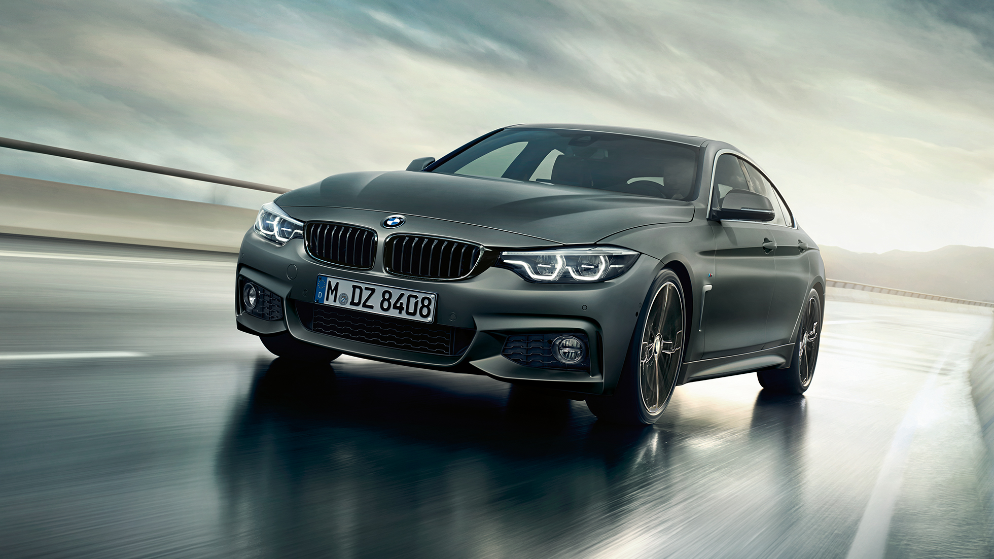BMW Serie 4 Gran Coupé, toma en la parte trasera de tres cuartos BMW Serie 4 Gran Coupé, toma en la parte trasera de tres cuartos