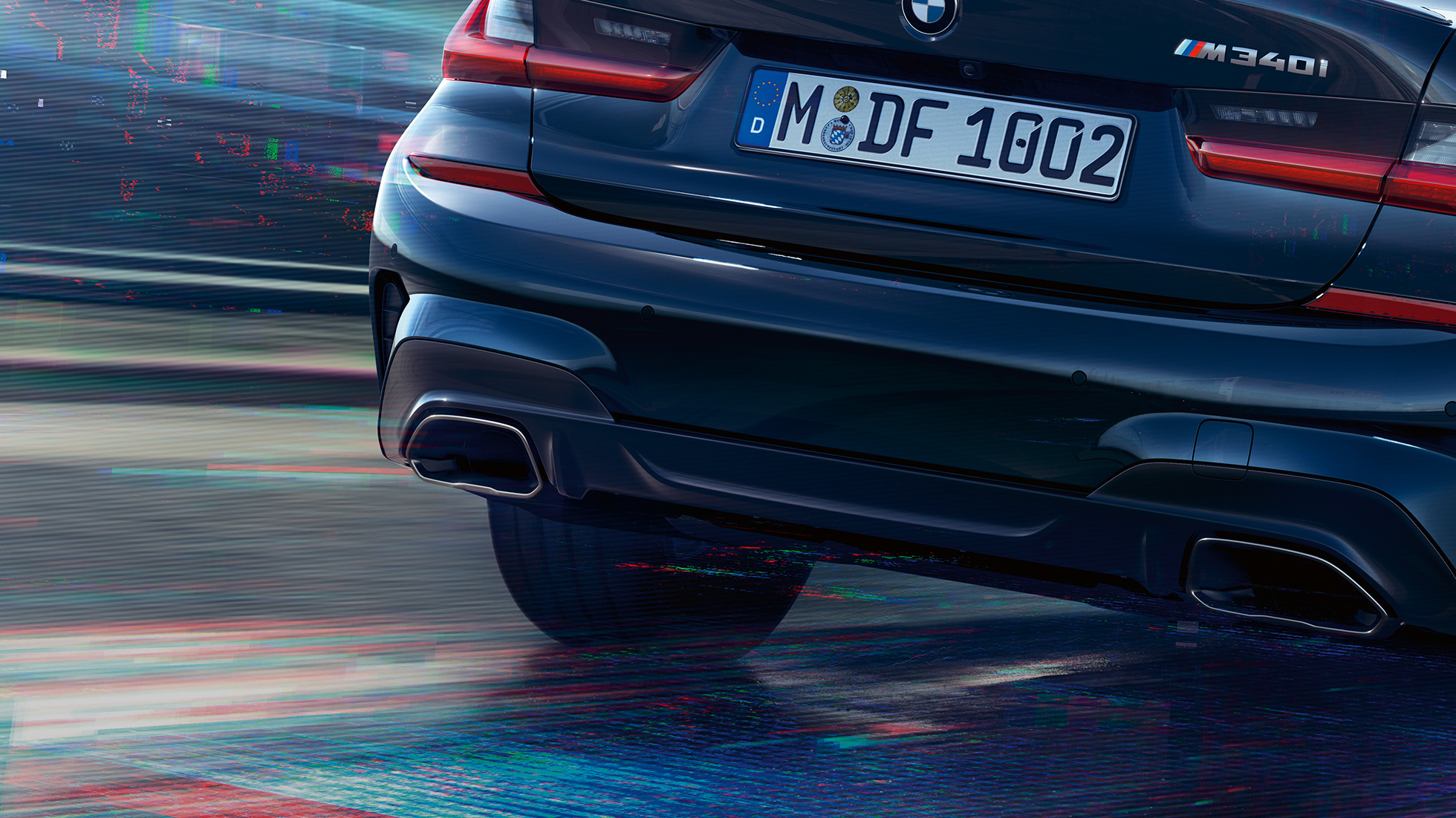 Molduras de los tubos de escape BMW M340i xDrive Sedán Molduras de los tubos de escape BMW M340i xDrive Sedán G20 Black Sapphire metalizado, primer plano