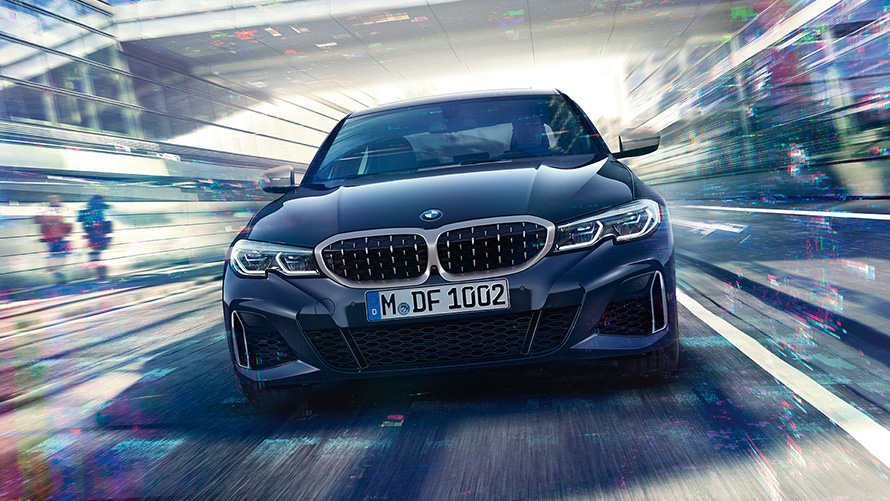 BMW M340i xDrive Sedán G20 2020 Black Sapphire metalizado Vista del frontal, en marcha