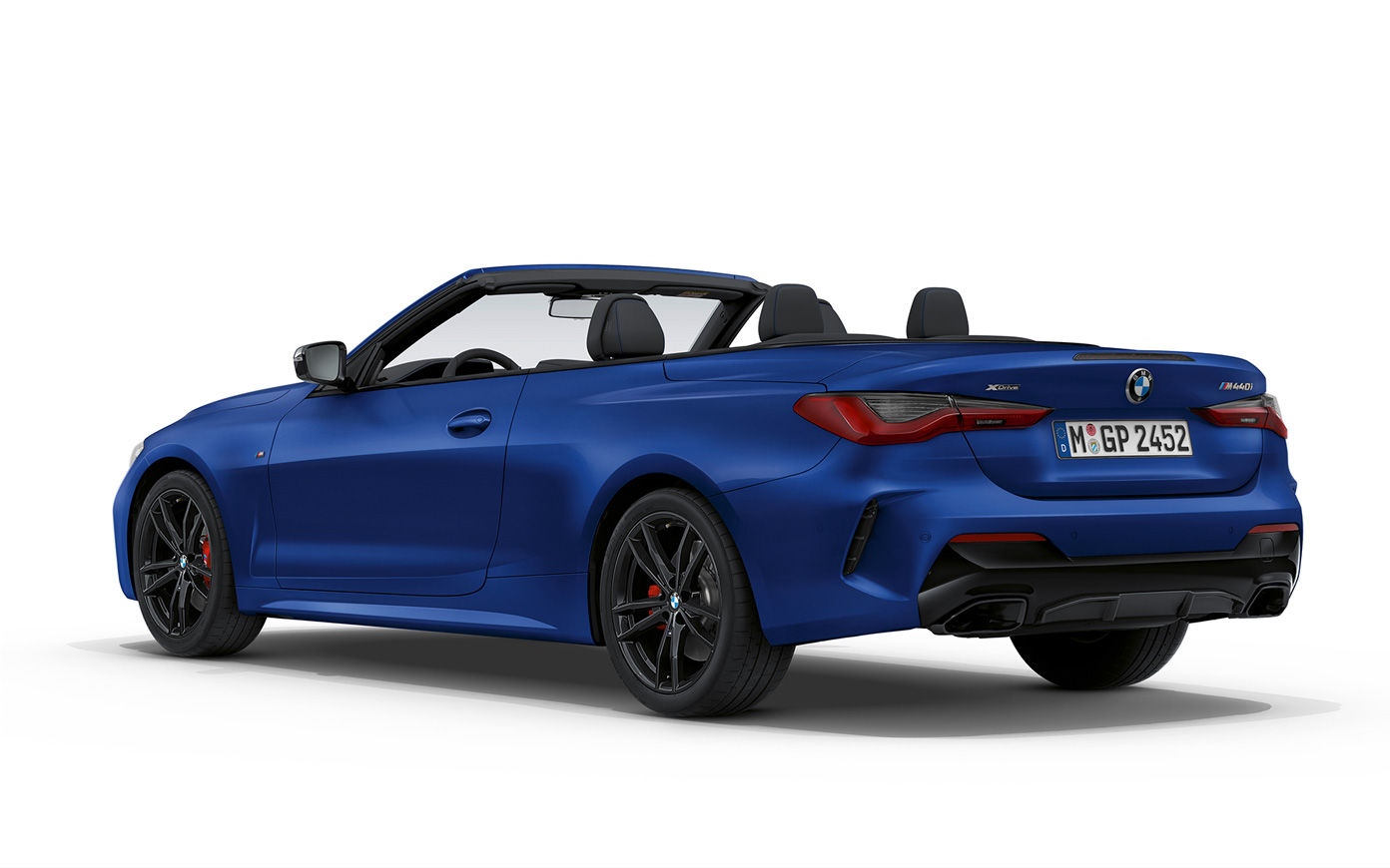 BMW M440i xDrive Convertible G23 2020 BMW Individual Frozen Portimao Blau metalizado, vista de tres cuartos de la zaga 