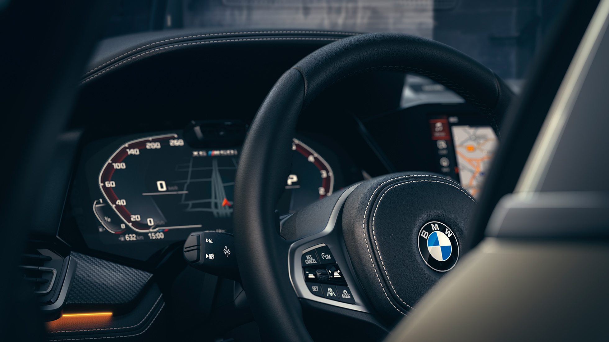 Sistemas de asistencia BMW. Acercamiento del interior del BMW con enfoque en el conjunto de instrumentos.